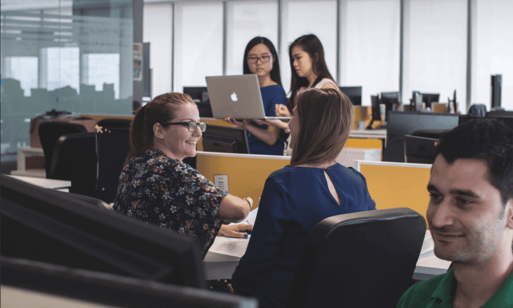 Group of co-workers in an open office