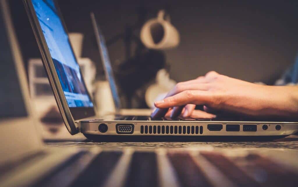 Person working on a computer photo by john schnobrich on unsplash