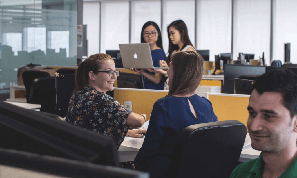 Group of co-workers in an open office