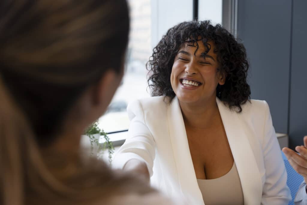 Smiling woman in an interview