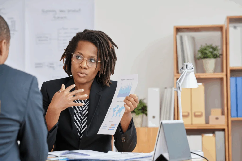 Businesswoman presenting statistical information