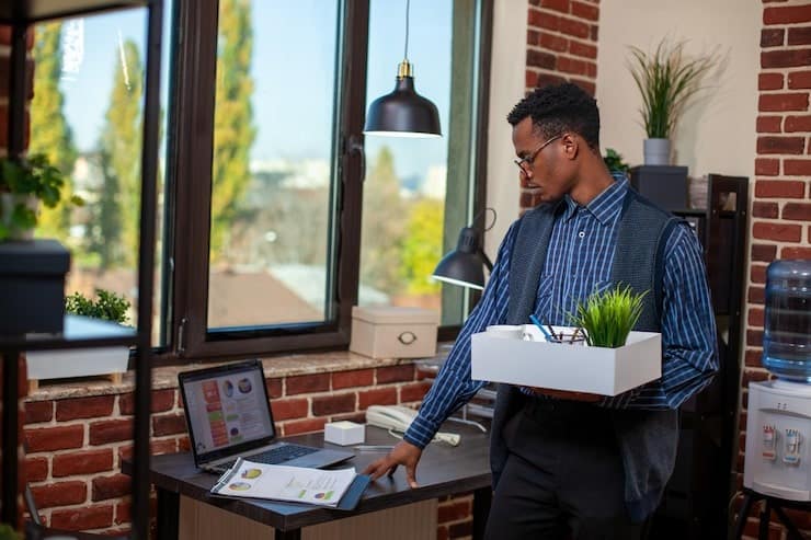 How to Reduce Attrition Risk with Skills Validation and ARI 3 Employee packing up their desk