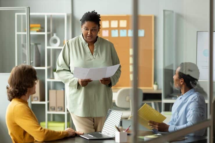 Types of Skills Assessments TA Leads and Recruiters Should Know About 1 A hiring team in a strategy meeting